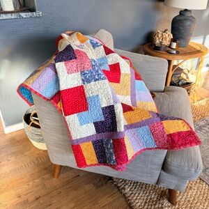 HAND MADE LAP QUILT
 Approximately 40“ x 40“ square
Bright colors
Non-smoking